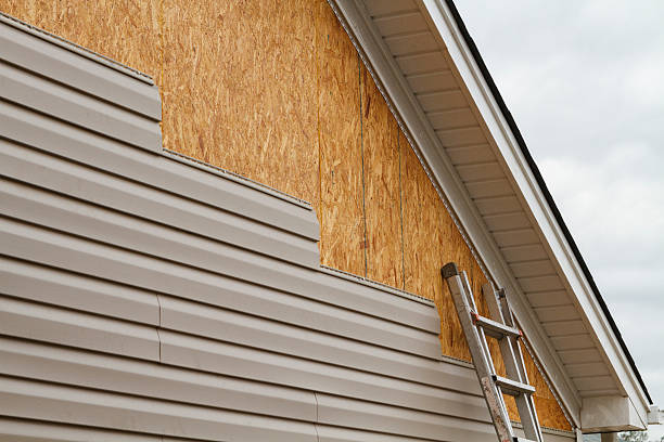 Professional Siding technician working in Urbanna, VA